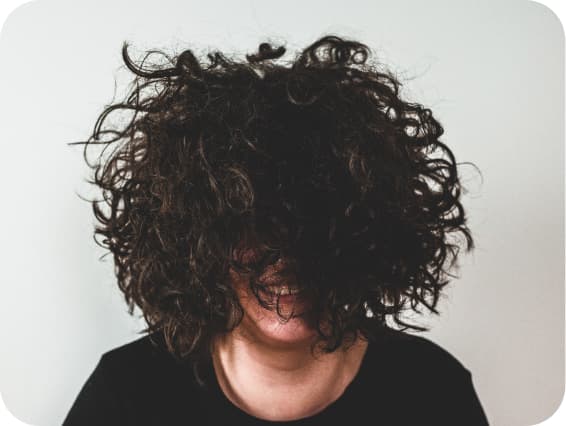 Woman with frizzy hair